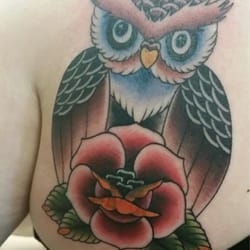 Rise Above Tattoo Co. logo