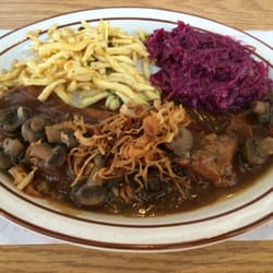 Helgas German Restaurant logo