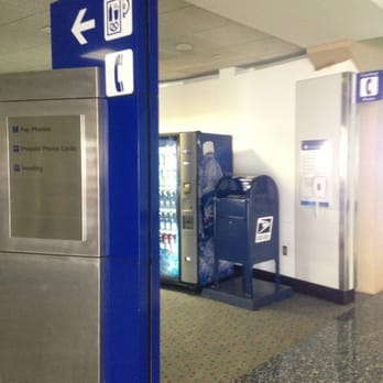 Dallas Fort Worth International Airport - USPS mailbox at Terminal E, by the SkyLink and vending machines. - Dallas, TX, United States