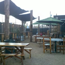 Patio full of board games, cornhole,…