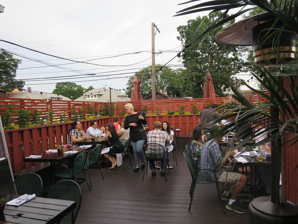 Libertad - Skokie, IL, United States. Rear patio view, on a pleasant summer evening.