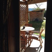 Photo of Evergreen Haus - Oakhurst, CA, United States. Private patio off of Sequoia Room.