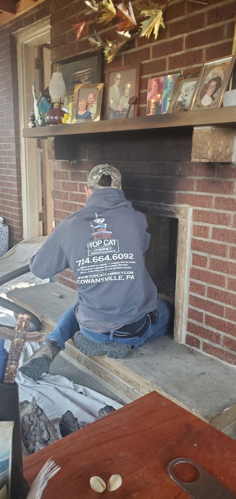 Top cat chimney sweep and service