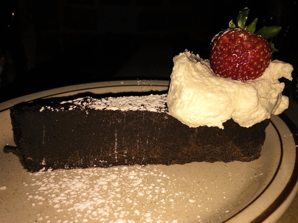 The sinfully good flourless chocolate cake. Yelp