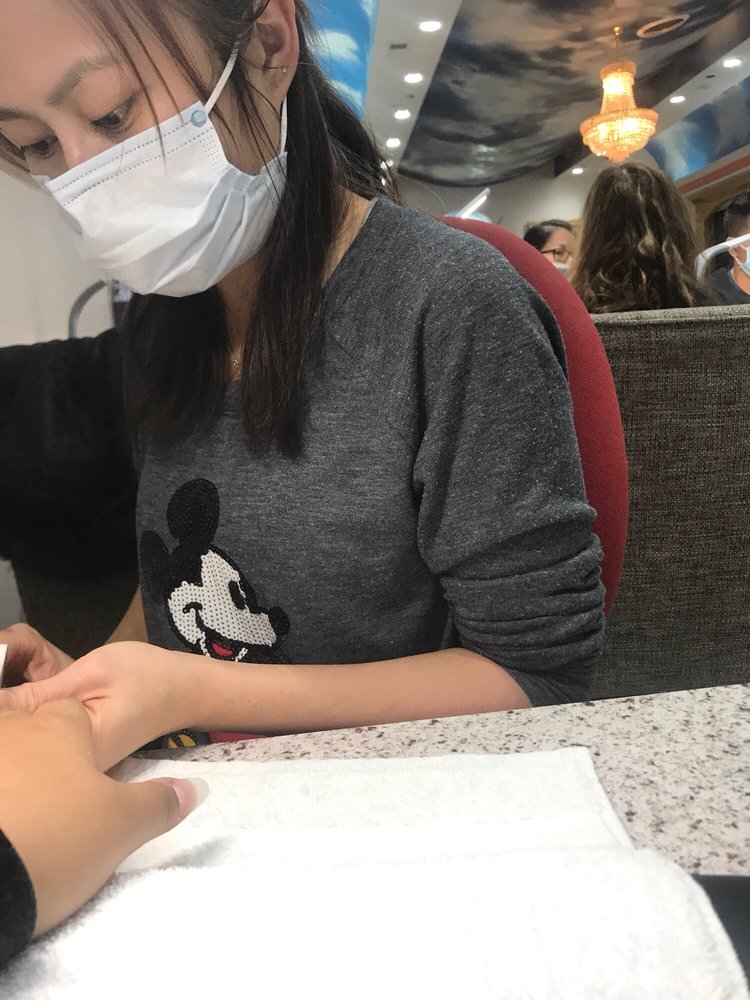 This is the person that damaged my 15 year olds nails. Yelp