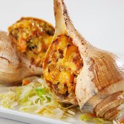 Photo of Ping's Seafood - New York, NY, United States. portuguese style baked stuffed conch