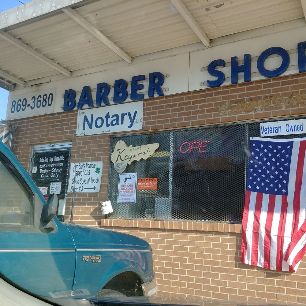 Longs Barber Shop and Notary Public Barbers 318 W 70th St