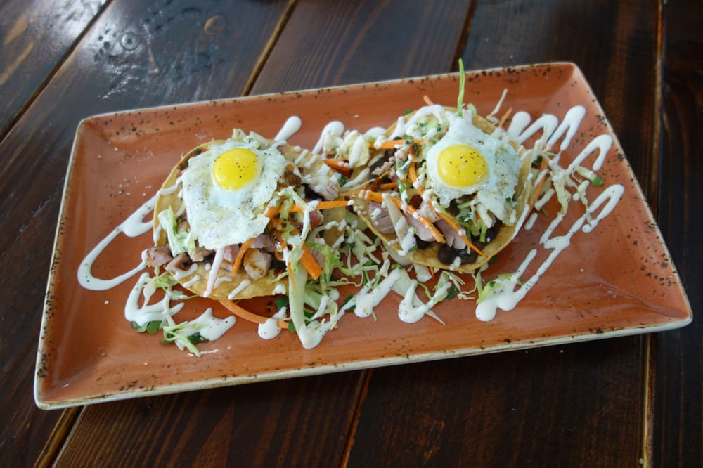 Tostada Ling Pig Black Beans Cilantro Slaw Salsa Quail Egg Photo Of Kitchen Table Henderson Nv United States Tostada Ling Pig