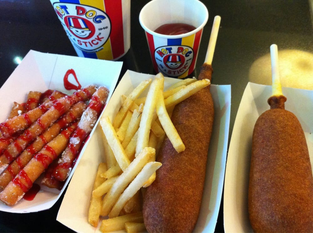 From left to right funnel cake sticks with raspberry sauce, kid's meal