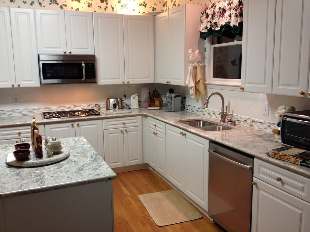 Final look after new granite countertops were installed. Yelp