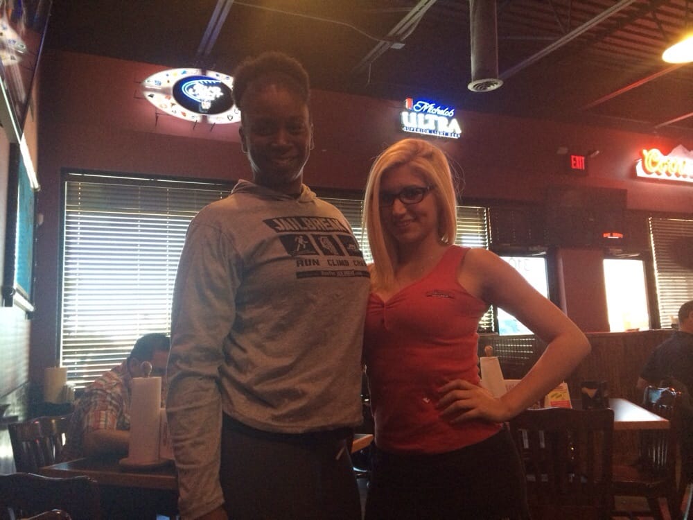 Me and waitress Jenny at the Wing Daddy's on N Mesa Street. Great