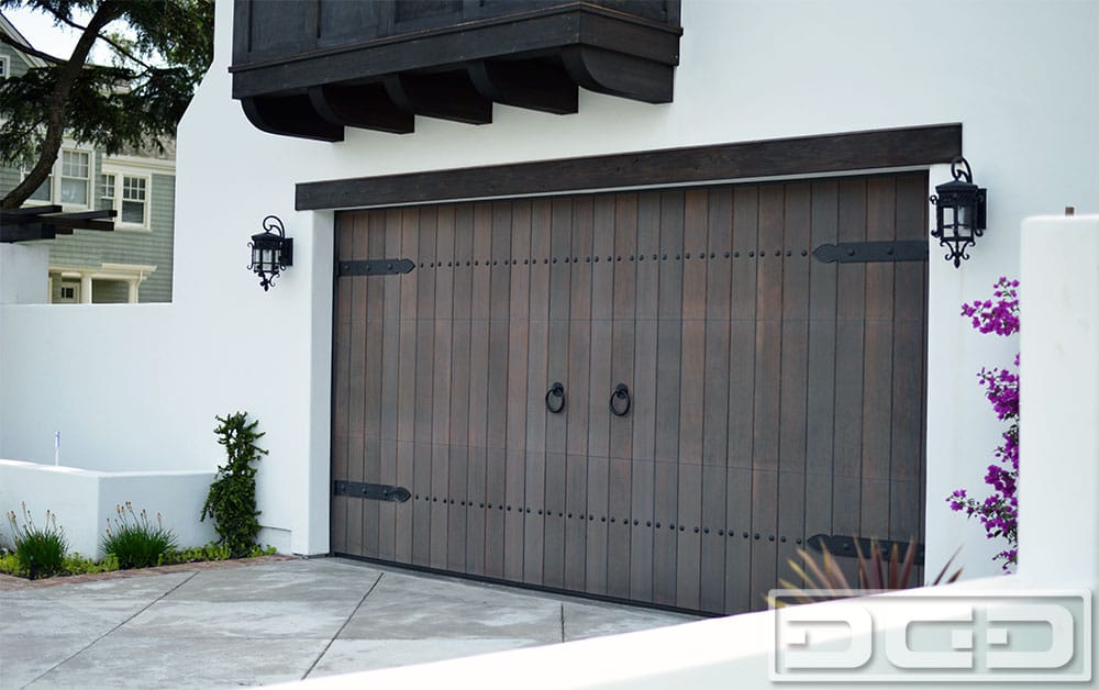Spanish Style Wood Garage Door Handmade In Solid Vertical Grain Doug Photo Of Dynamic Garage Door Santa Ana Ca United States Spanish Style