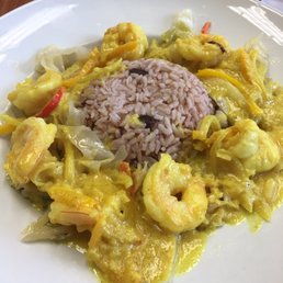 Coconut curry shrimp, peas and rice