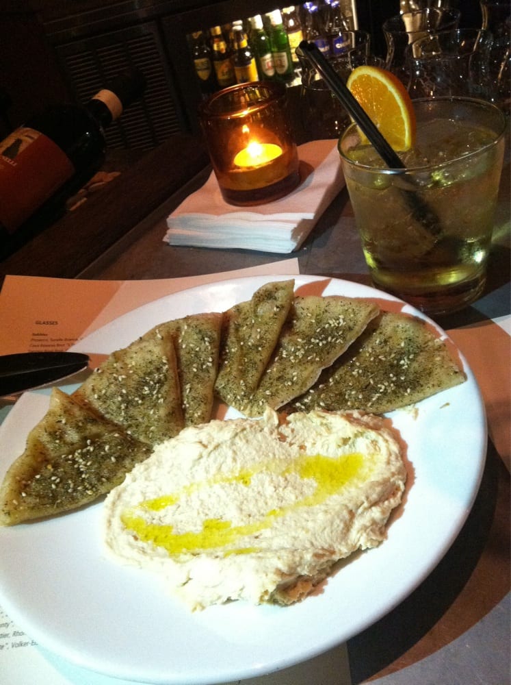 Madetoorder pita bread with sesame and oregano accents served with