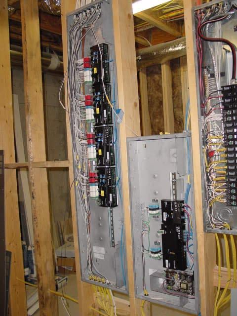control4 panelized lighting control with a 5 slot and 2 slot panels