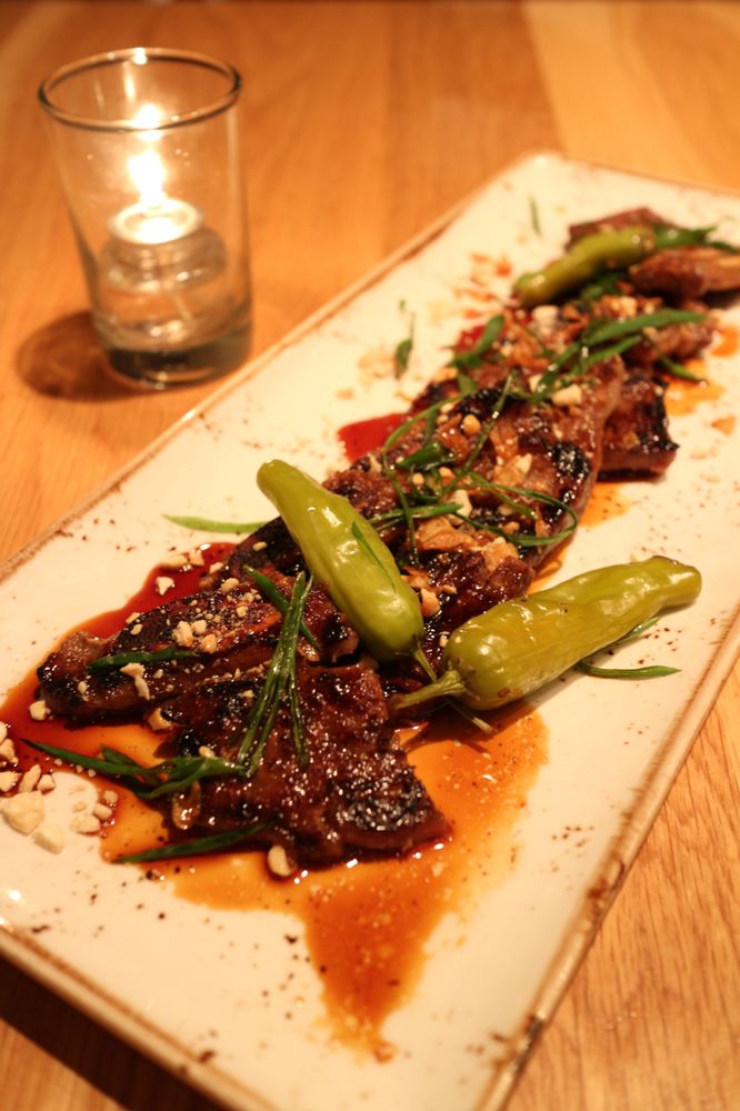 Kalbi beef short ribs with fried garlic, cashew bits, scallion, ginger
soy glaze and pickled