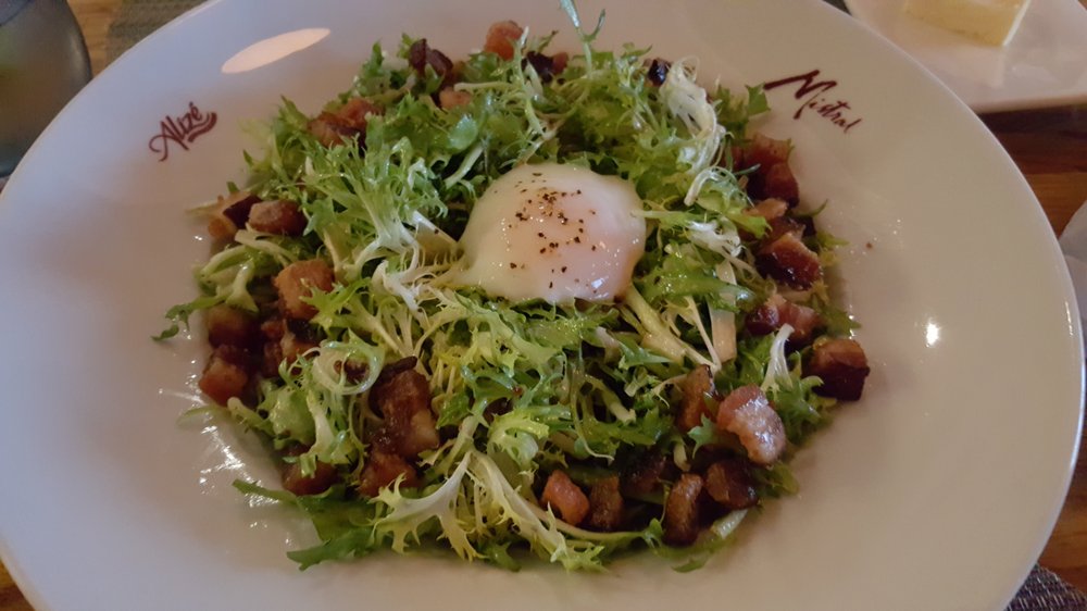 Photo of Andre's Bistro & Bar - Las Vegas, NV, United States. Lyonnaise salad