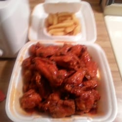 Yum's Chinese Carry Out logo