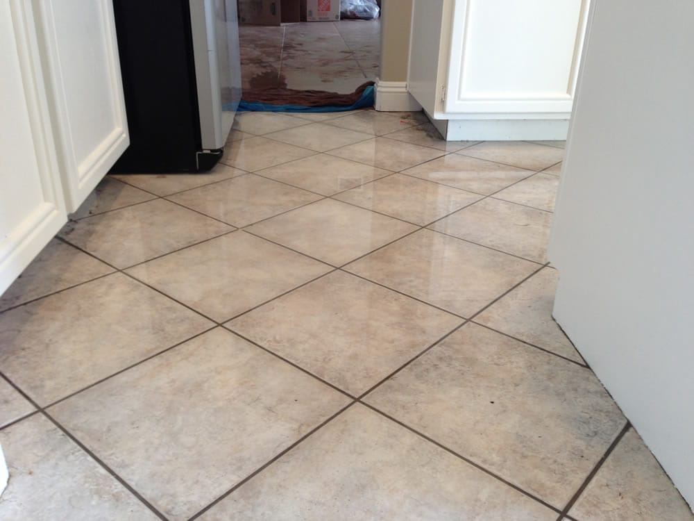 Water Damage In Kitchen Caused By Leak Under Sink