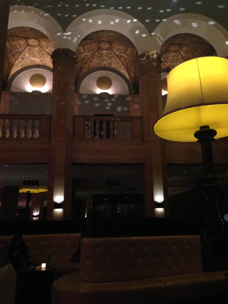 the lounge like lobby of the w hotel doubles as extra seating for