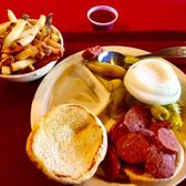 Photo of Marshall's Bar-B-Q - Farmers Branch, TX, United States. Sandwich basket, smoked sausage(bland and rubbery) and fries.....
