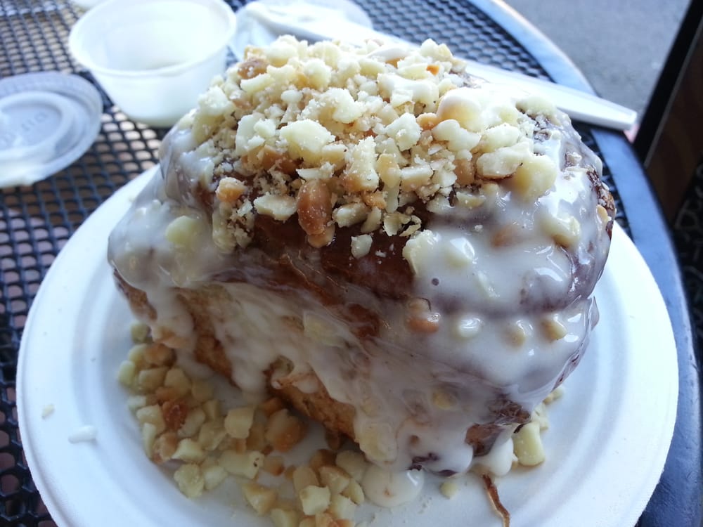 Cinnamon roll with mac nuts & cream cheese frosting! Yelp