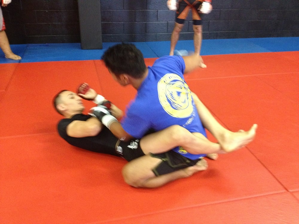 Rylan Lizares (Black belt JiuJitsu Instructor) & Max Holloway (UFC