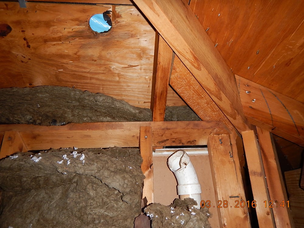 Broken drain waste vent pipe during roof installation. This attic was a