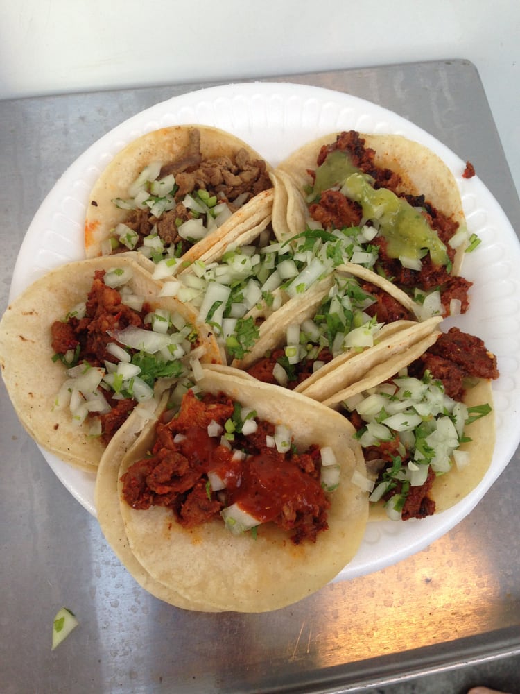 Tacos with condiments Yelp