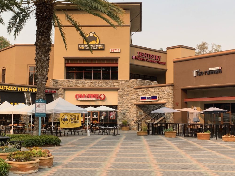 image of business Aliso Smiles
