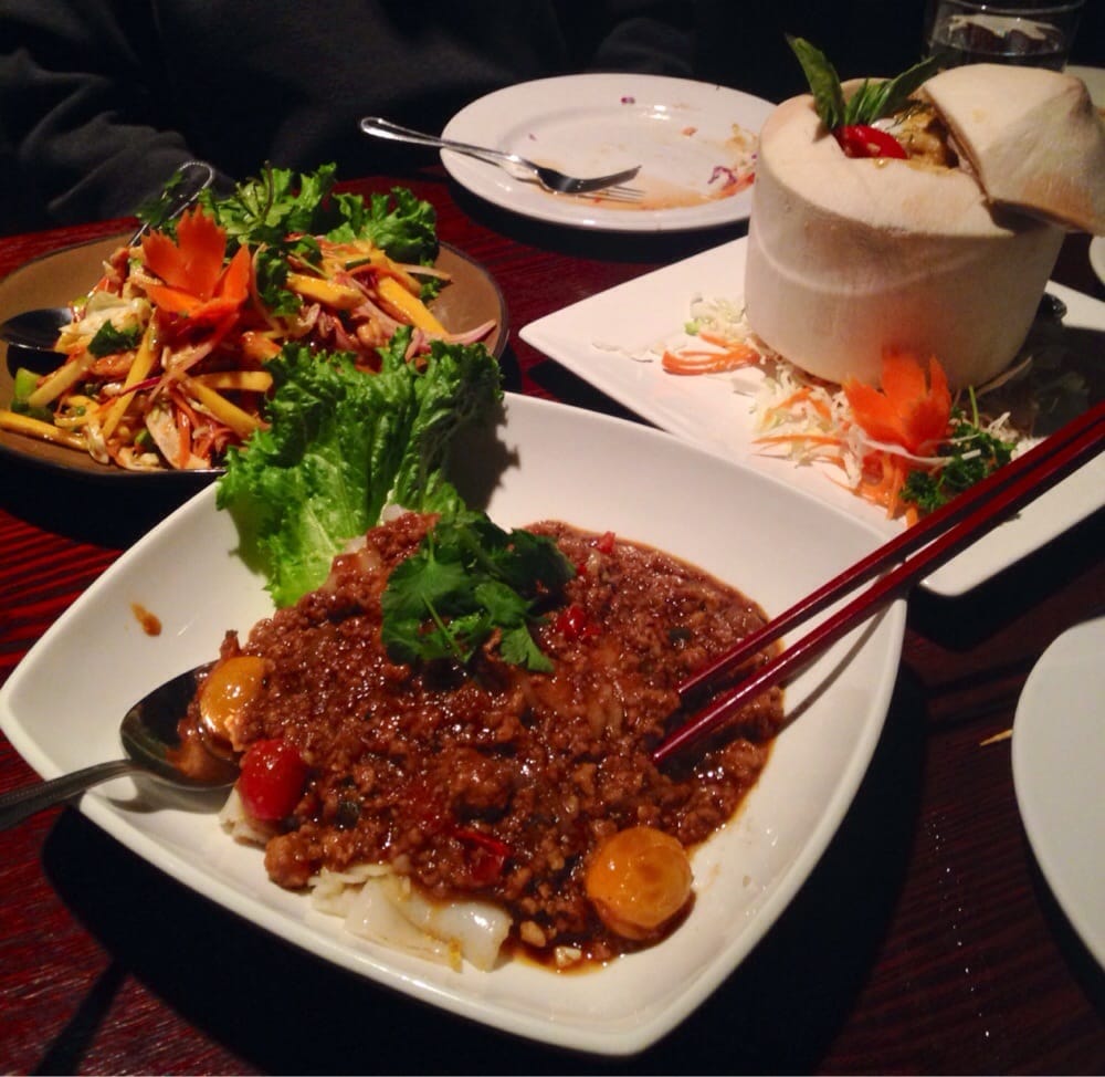 Red Curry Seafood Special Served In Baby Coconut Siam Lotus Noodle Photo Of Siam Lotus Asian Kitchen Bar Beaverton Or United States
