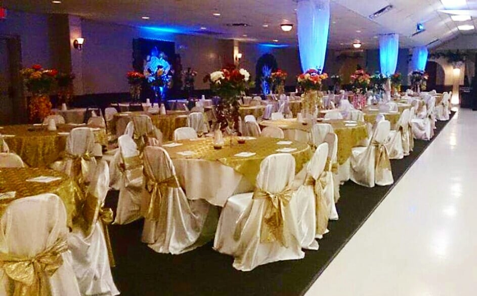 Gold And Ivory Satin Chair Covers With Blue Up Lighting