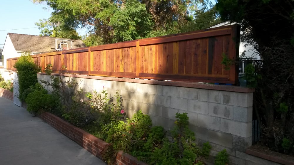 Custom Floating Wood Privacy Fence Above Short Concrete Block Wall 114 Photos For Wood Fence Expert