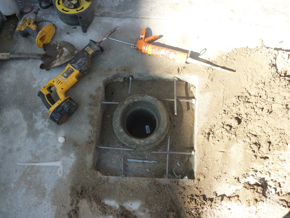 Installation of main line sewer drain clean out access in driveway - Yelp