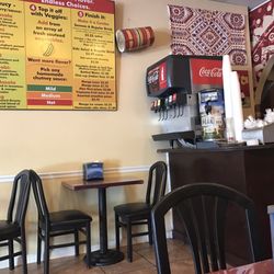 Photo of Shalimar Curry House - Columbia, SC, United States. Not a visible cash register but I heard the sound of it behind the soda machine