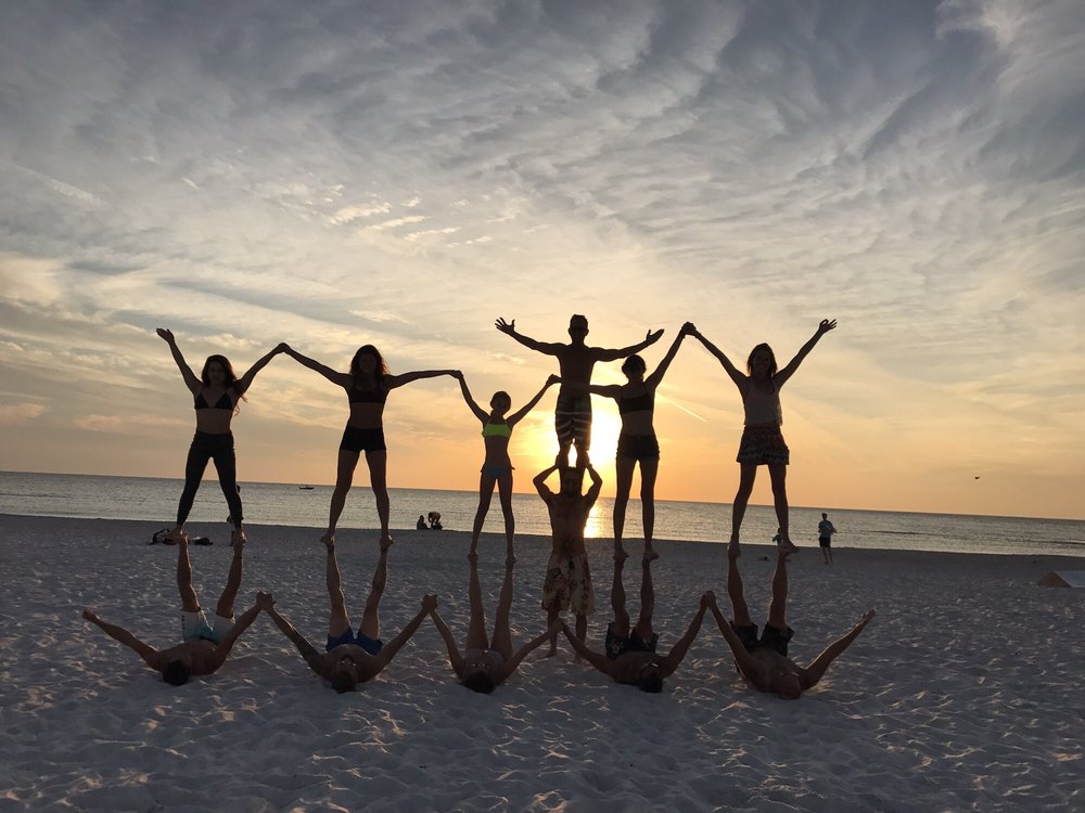 Beach Saint Pete Beach FL United States Friends Doing Acro Yoga
