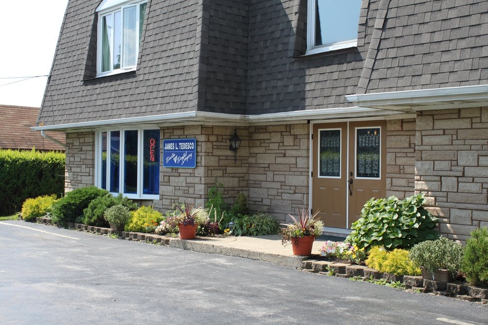 image of business Emergency, Implant & Fine Cosmetic Dentistry