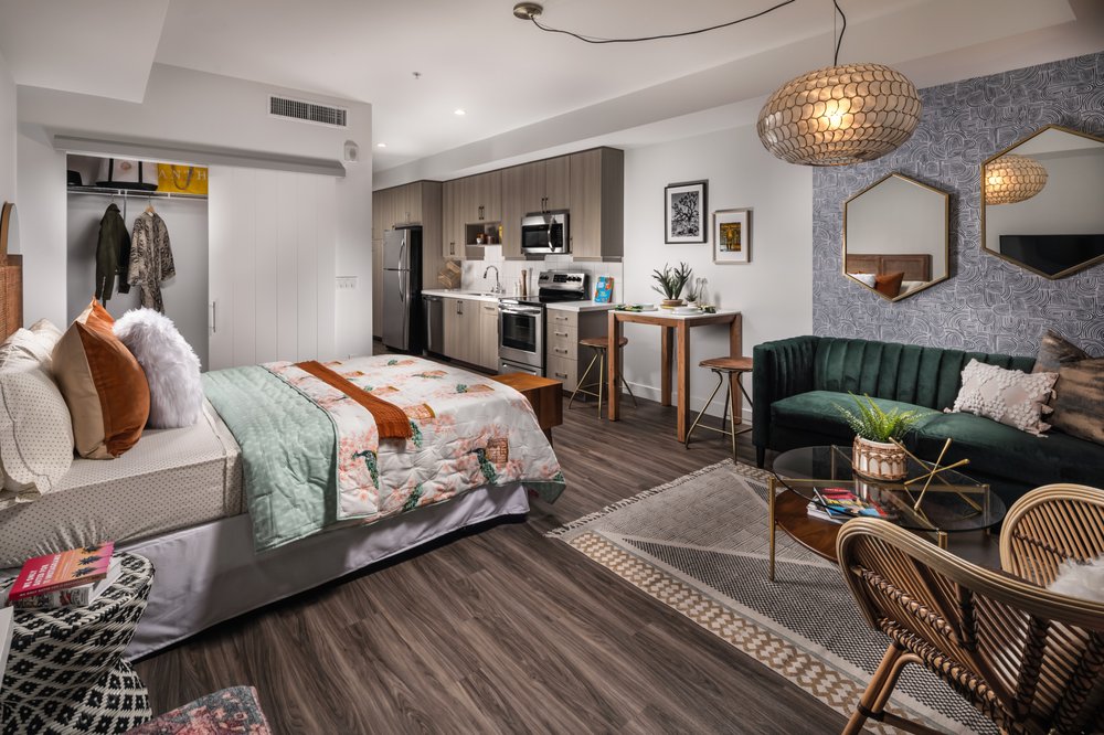 Photo of LA Plaza Village Apartments - Los Angeles, CA, United States. Studio Living/Bedroom