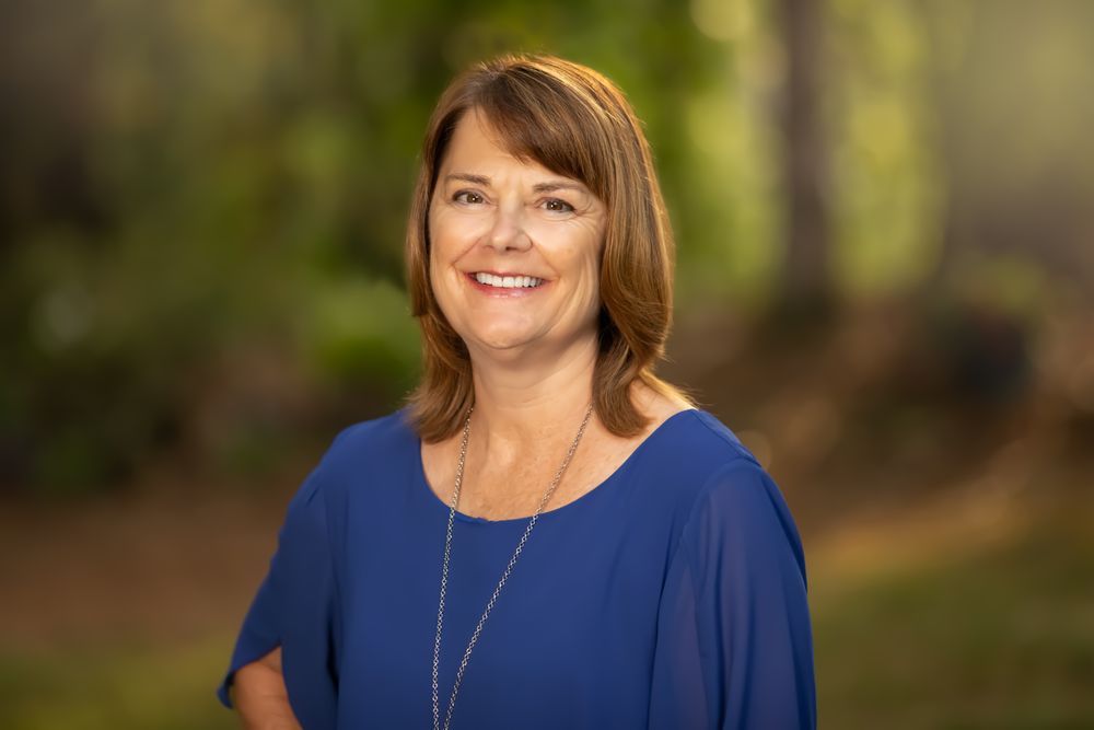 Peggy Houser - Pinnacle Group Realty