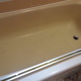 Dark tan 60's era tub that was faded, scratched, chipped, and just plain ugly.
