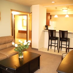 Unique Suites Hotel 16 Photos Hotels 920 W Lincoln Ave Photo Of Unique Suites Hotel Charleston Il United States Living Room Portion