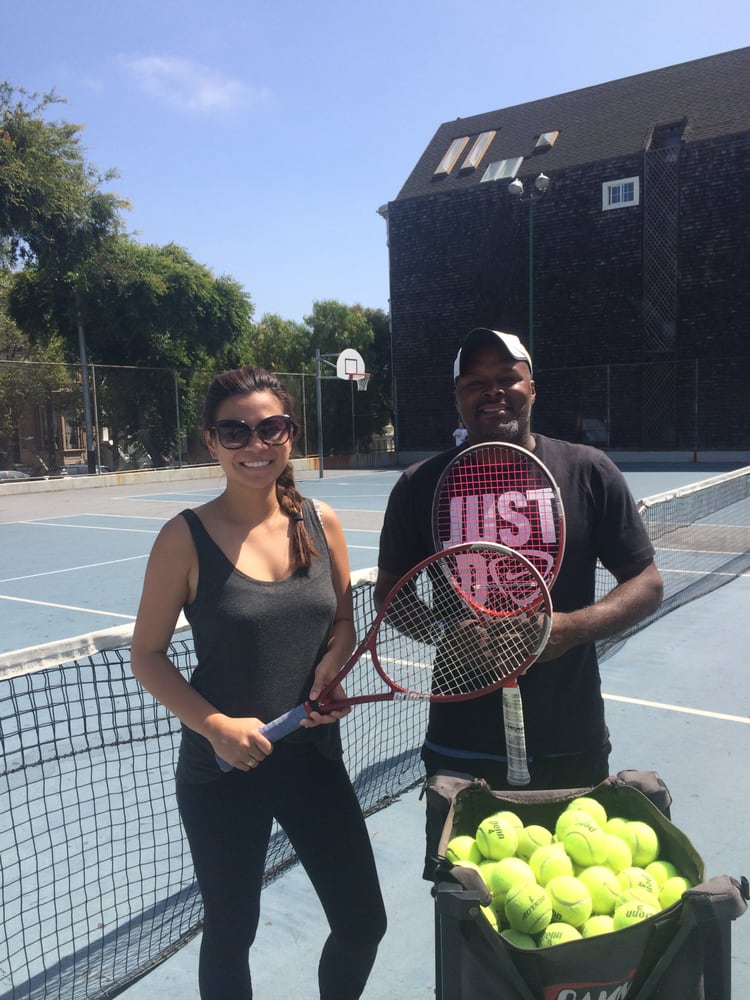 Tennis Lessons By Mcclain - San Francisco, CA, United States. Coach Mcclain and his client Stephanie, has a mean forehand :)