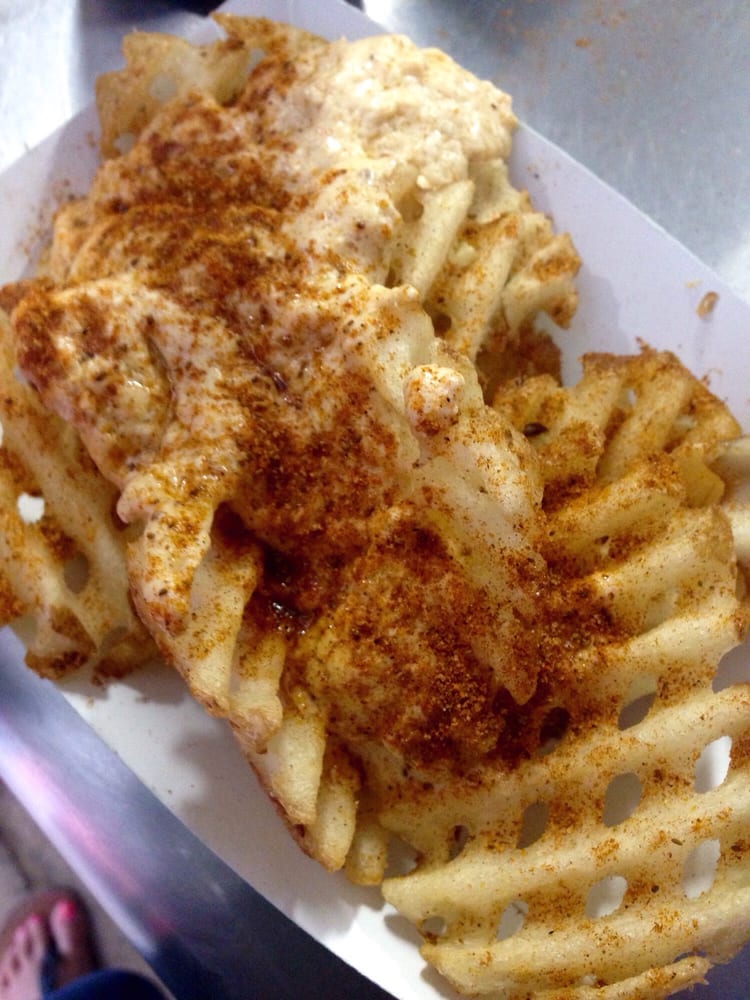 Chesapeake fries waffle fries with crab dip and old bay Yelp