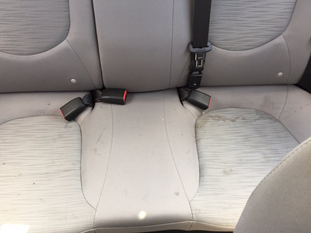 Back Seat Stained With Coffee Soda And Who Knows What Else