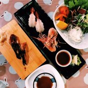 Photo of Zen Toro Japanese Bistro & Sushi Bar - Davis, CA, United States. Unagi nigiri, amoebic, and poke salad