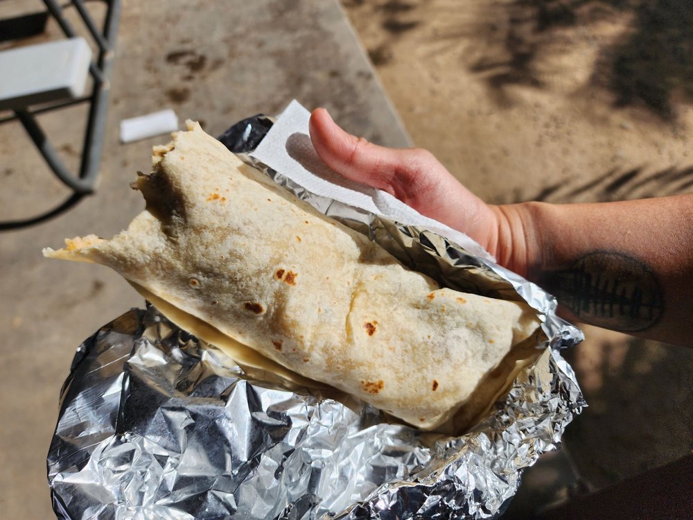 Food from Nelly's Tacos