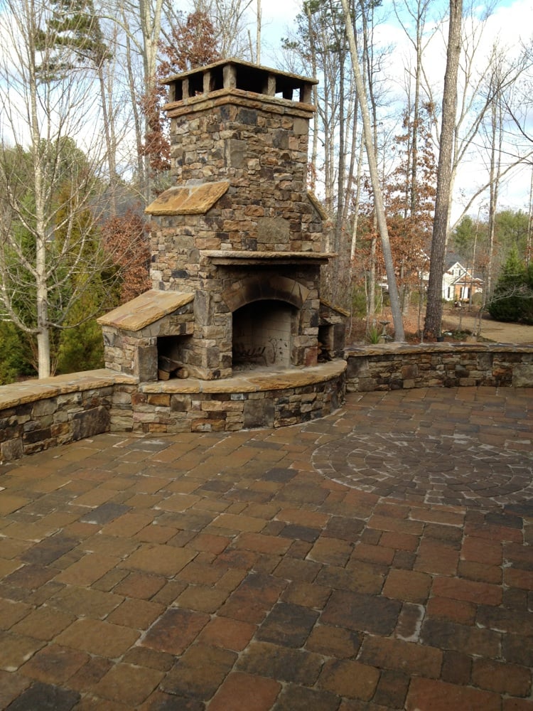 Outdoor Paver Patio With Natural Stone Fireplace And Sitting Wall Photo Of Dogwood Landscaping Dallas Ga United States Outdoor Paver Patio With