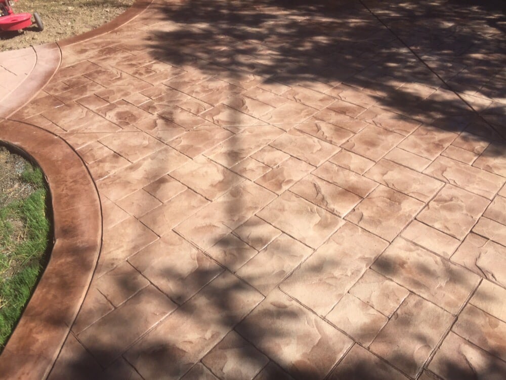 Pebble colored concrete with chestnut powder stain - Yelp Pebble colored concrete with chestnut powder stain - Yelp