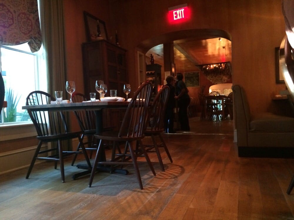 Dining area looking in at bar area Yelp