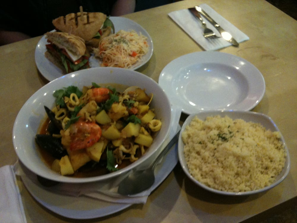 Rustic eggplant sandwich (top), Sultan seafood stew (bottom left) and